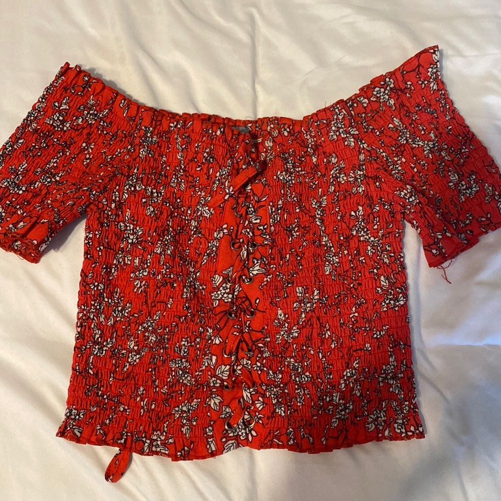 Brand: NLW current fashions. Red floral off the shoulder tie up shirt